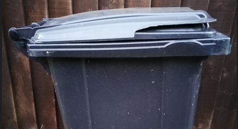 Black rubbish bin