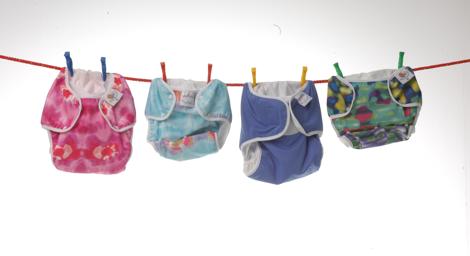 Cloth nappies hanging on a line. 